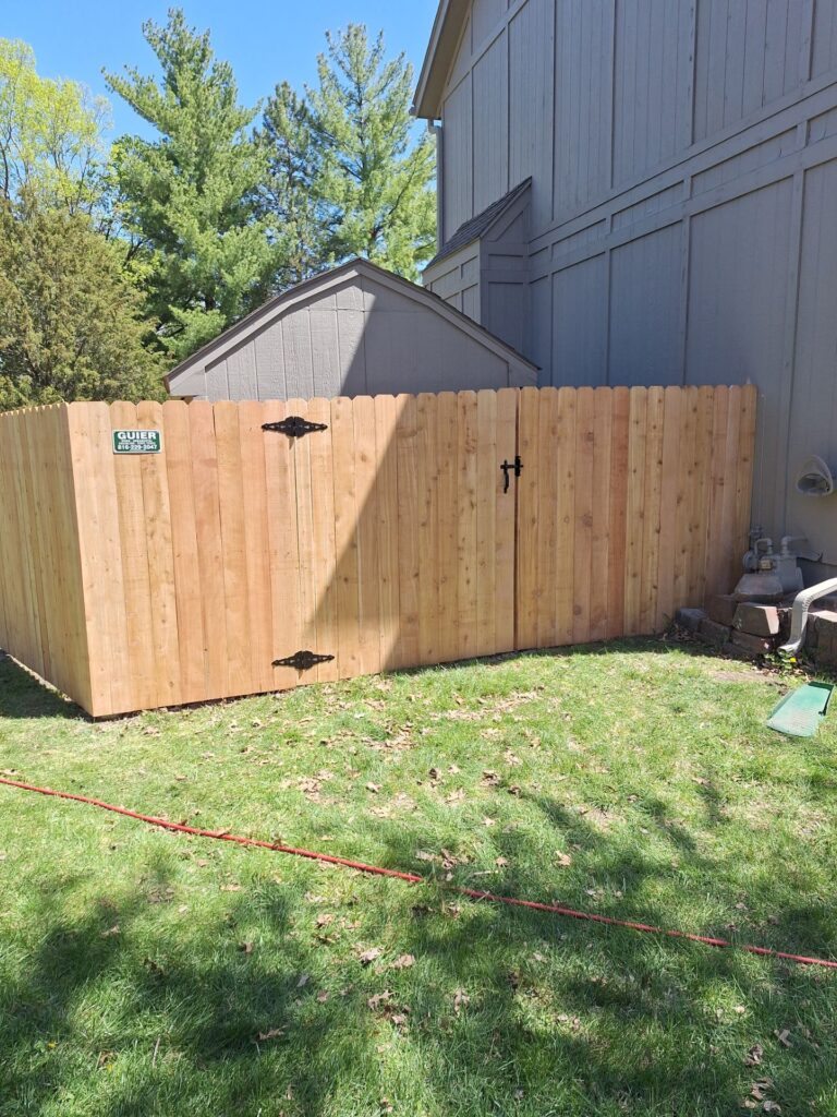 New wooden fence with gate