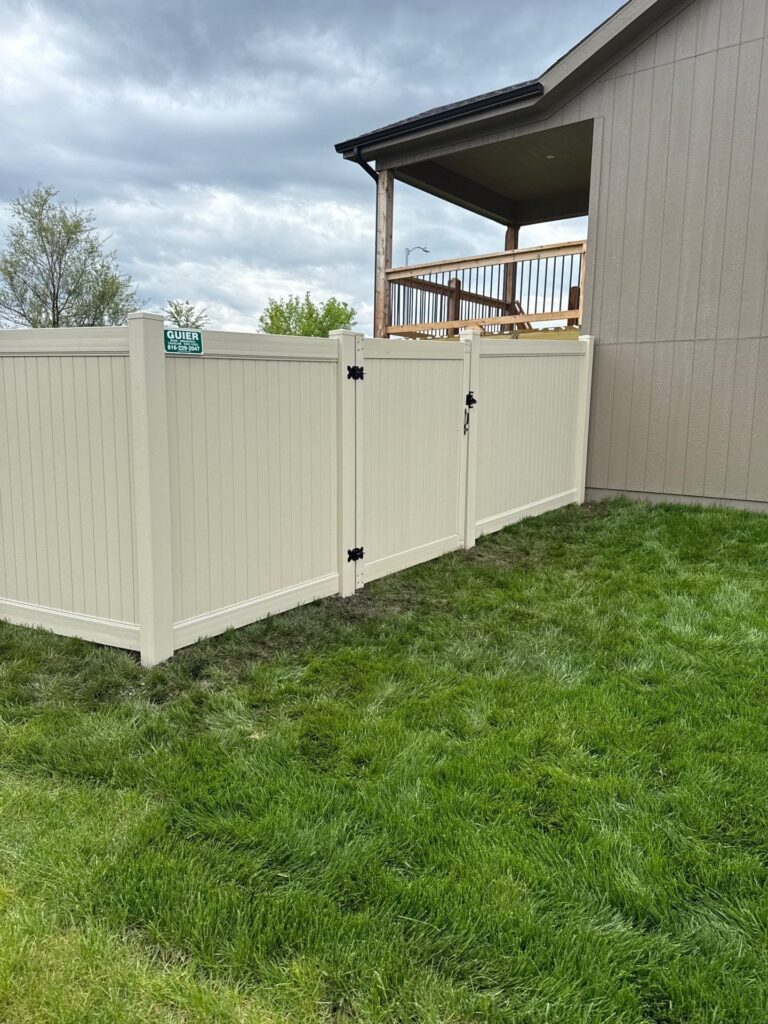 Vinyl Fencing Kansas City Beige vinyl fence with gate