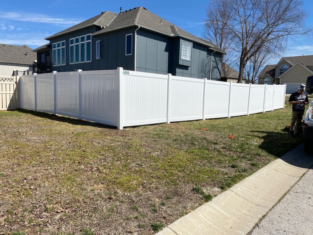 Vinyl Fencing Kansas City White vinyl fence installation.