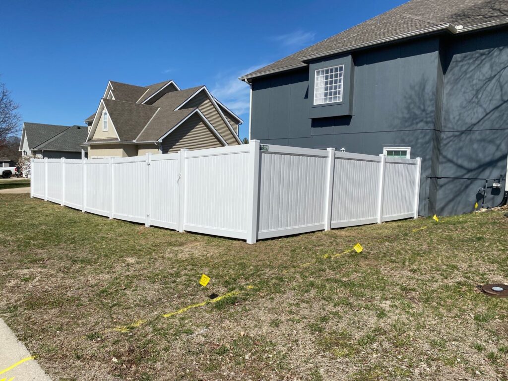Vinyl Fencing Kansas City White vinyl fence installation.